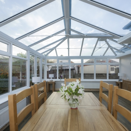 Sun shining through a glass roofed conservatory