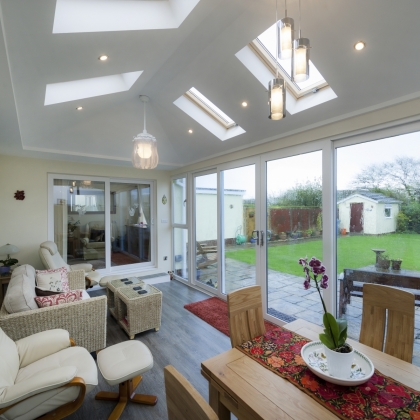 inside view of a conservatory with rainy outdoors