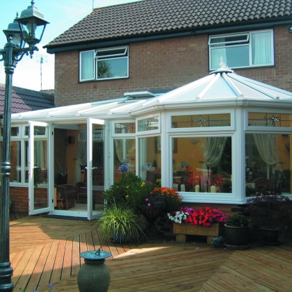 Sunny uPVC conservatory with open doors
