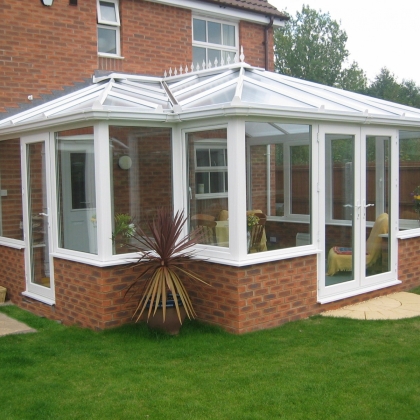 Outside view of a conservatory with pot plant