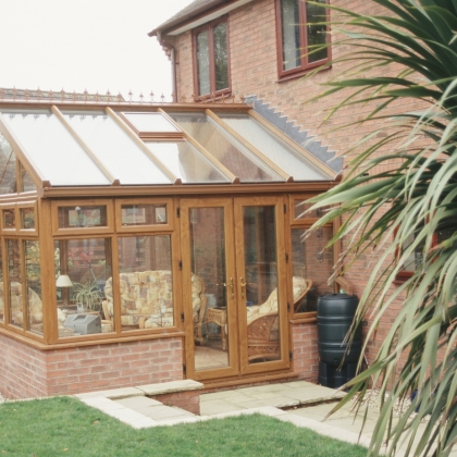 uPVC Woodgrain Conservatory with wet garden