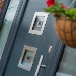 Close up Contemporary Composite door with hanging flower basket
