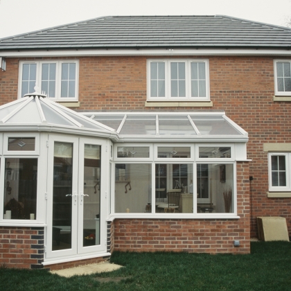 Glazed extension on the side of a house