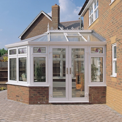 Glazed extension with brick patio