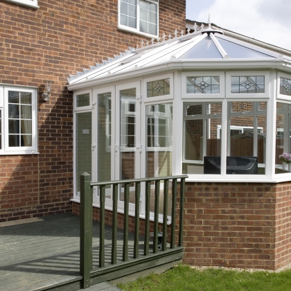 Glazed uPVC extension with dark decking