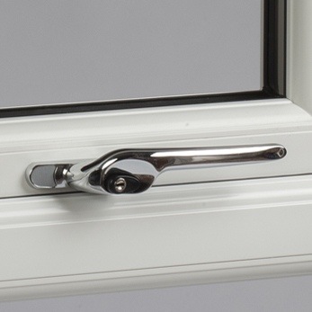 Casement window with a metal handle