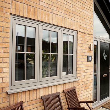 House with PVCu Flush sash windows and black front door