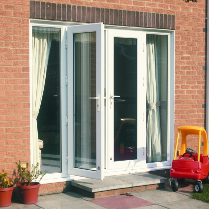 White uPVC French doors with Toddler and toy car