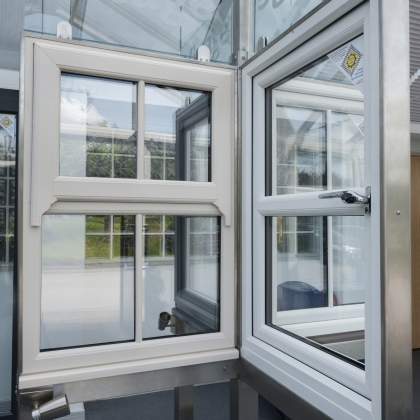 Inside and outside view of Heritage style uPVC window in a Showroom