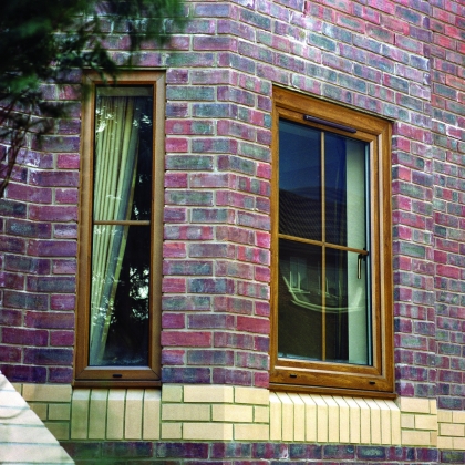 Closed tilt and turn window in multi coloured brick