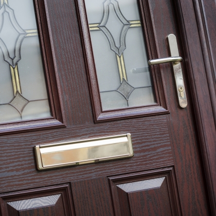 Rosewood composite door with letter box