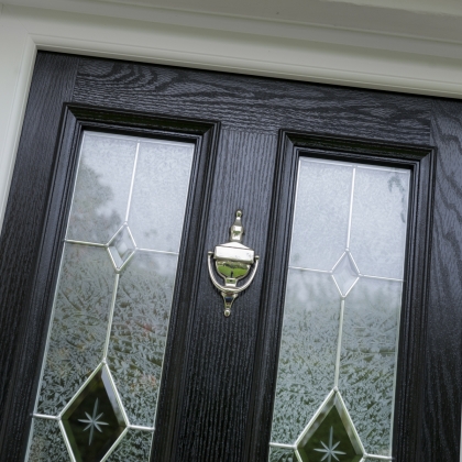 uPVC frame with black composite door