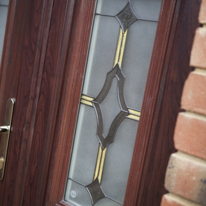 Rosewood composite door with glazed panel