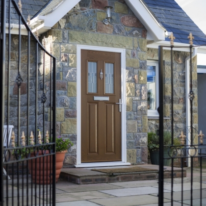 Composite floor with uPVC frame behind open gates