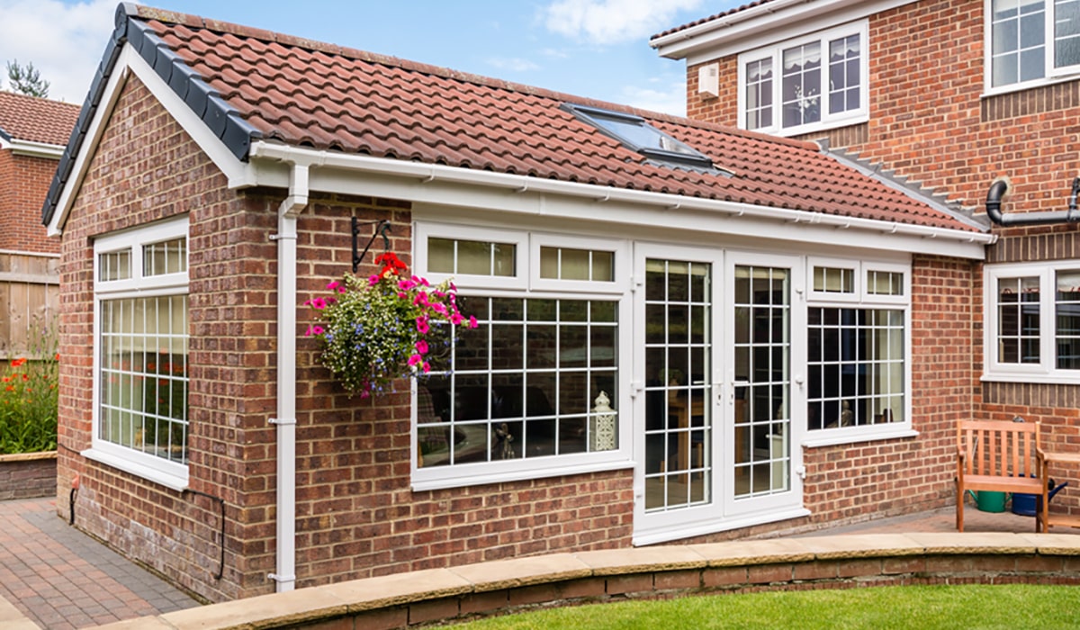 Orangery with white French doors and white PVCu windows